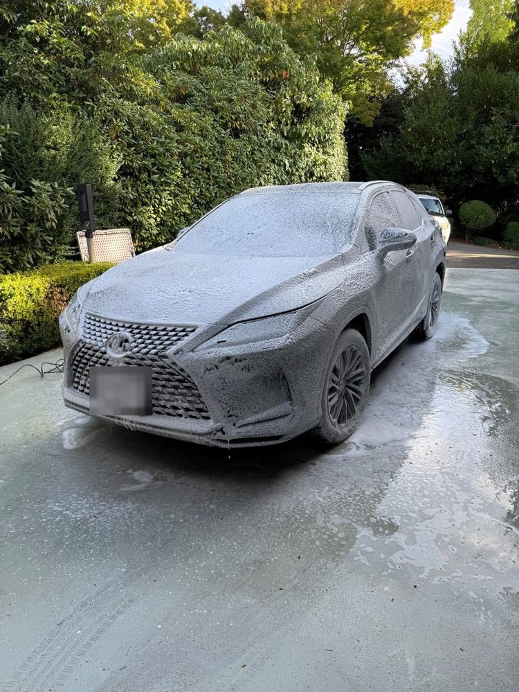 Lexus RX covered in foam during the pre-wash